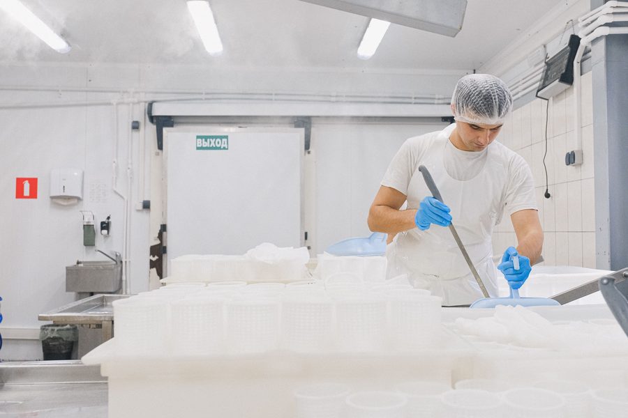 Food manufacturers reviewing FSMA Food Safety Plan hazard analysis, preventive controls, recall plan, and reanalysis dates across facilities