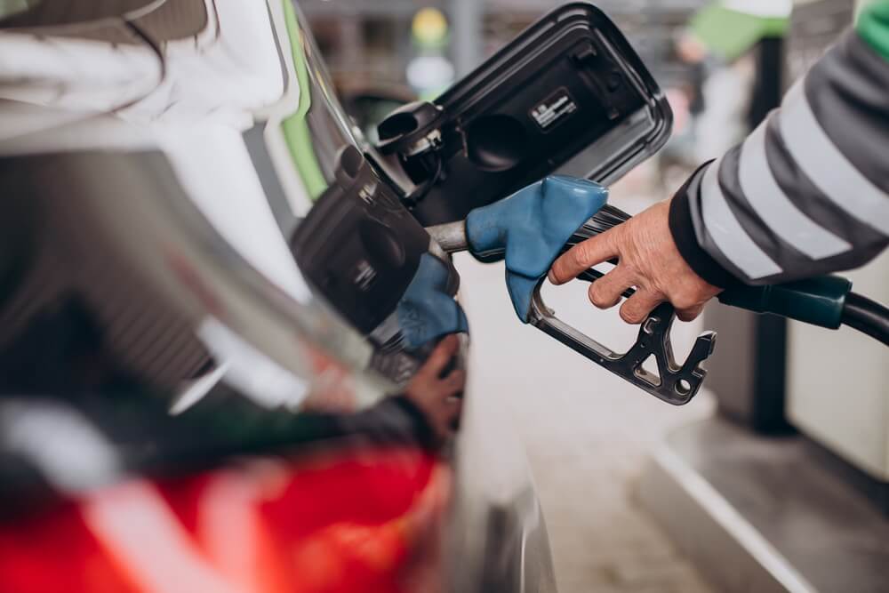 A fleet back-office manager reviewing IFTA quarterly fuel-tax filing deadlines and the annual license renewal on a calendar