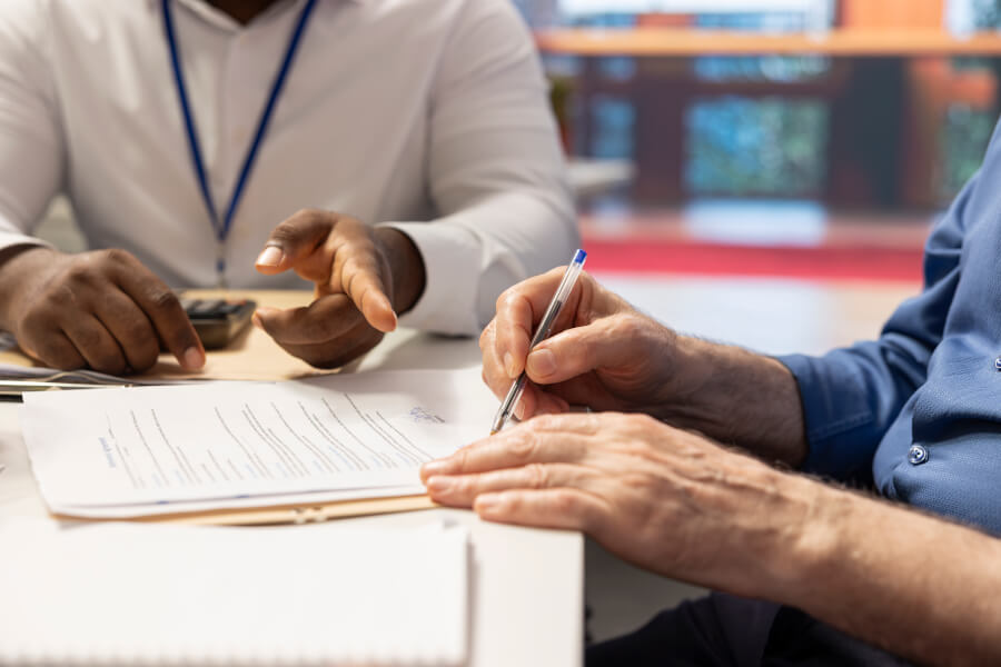 An export-compliance manager at a defense manufacturer reviewing the company's annual DDTC registration renewal date, keeping the ITAR registration active so license applications keep flowing