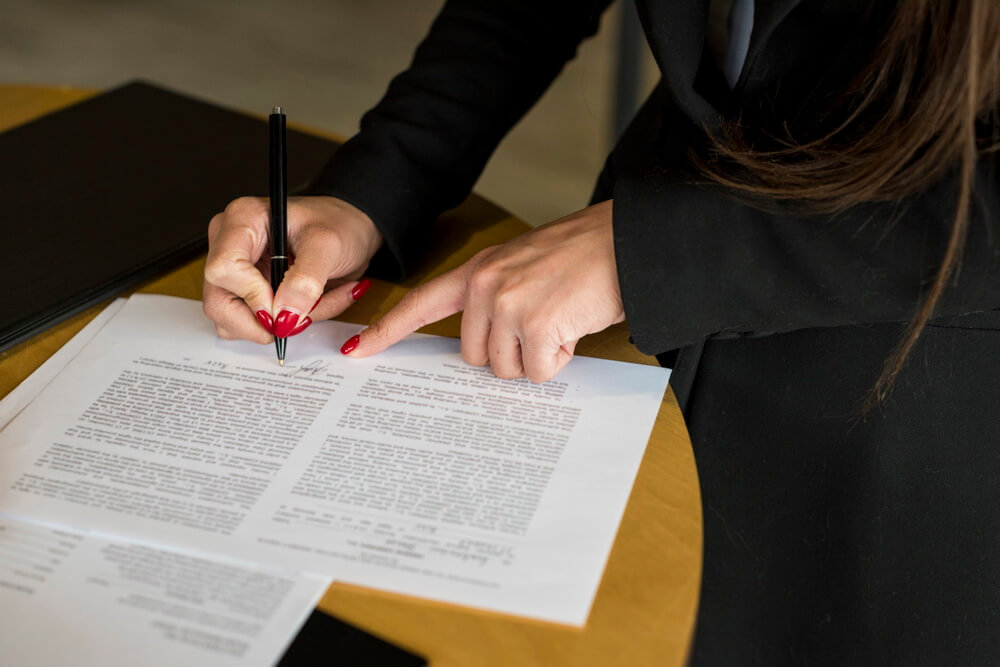 A legal and finance team reviewing the scope, agent, and end conditions of every power of attorney the business has granted or relies on