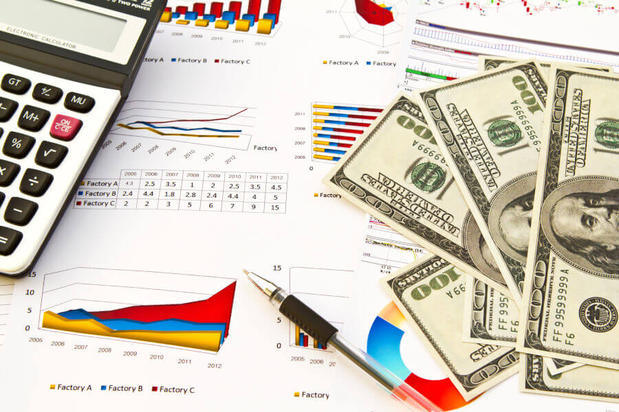 A finance lead reviewing sales by state against economic-nexus thresholds on a map, watching where volume &mdash; not a physical office &mdash; creates a new sales tax obligation