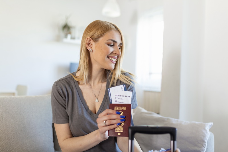 Employee passport documents organized for international business travel tracking