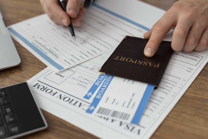 Business travelers at an international airport with passports ready for departure